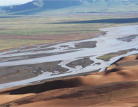 The Upstream of Tongtian River with Sand Dunes